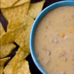 Green chili crack dip- this is so addictive and easy to make! This is our FAVORITE party dip and its always gone before anything else!