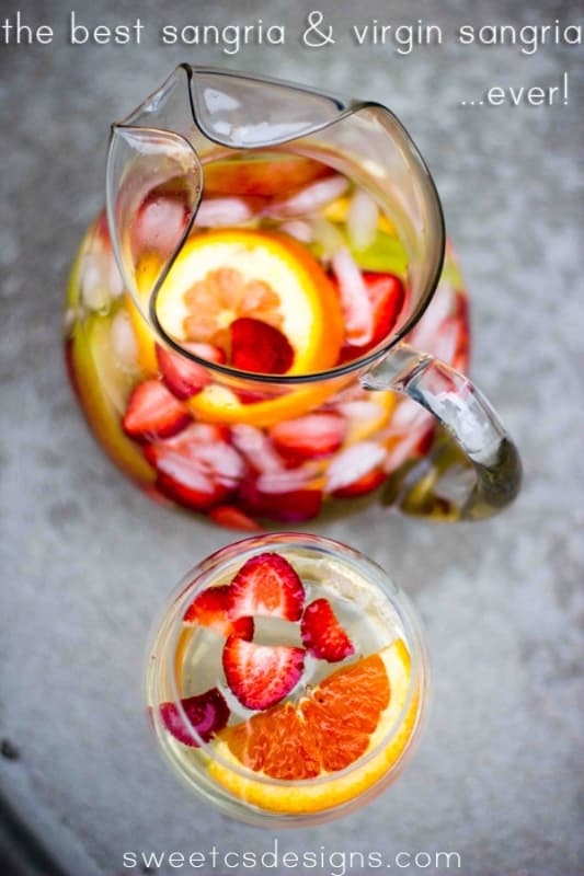 pitcher with ice, wine, and fruit in it