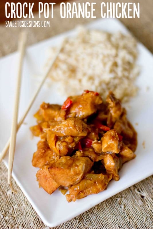 chicken in orange sauce with bell pepper, chop sticks, and rice