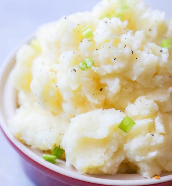 A quick and delicious recipe for mashed potatoes topped with green onions.