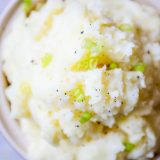 Slow Cooker Mashed Potatoes with green onions.