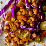 Chickpea burritos served on a white plate, perfect for vegans.