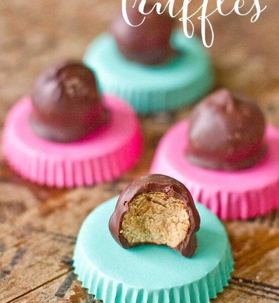 Cookie butter truffles on a wooden table.