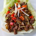 Keto beef lettuce wraps served on a white plate.