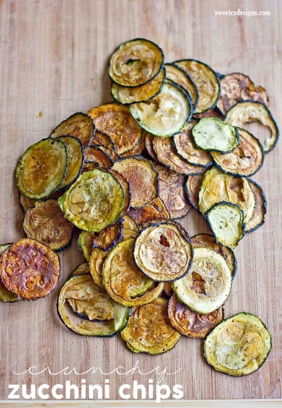 baked zucchini slices with salt and pepper on them. 