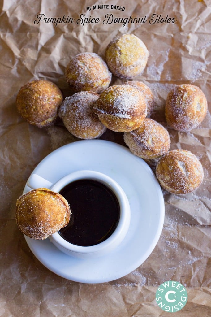 coffee and stack of donut holes covered in cinnamon and caster sugar