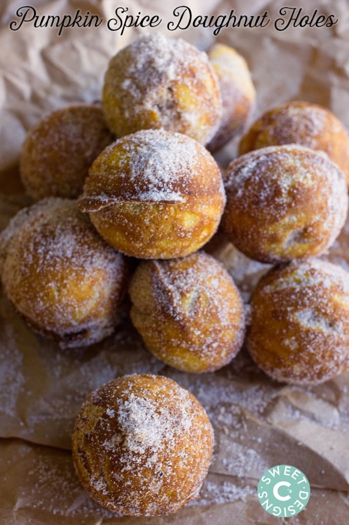 stack of donut holes covered in cinnamon and caster sugar