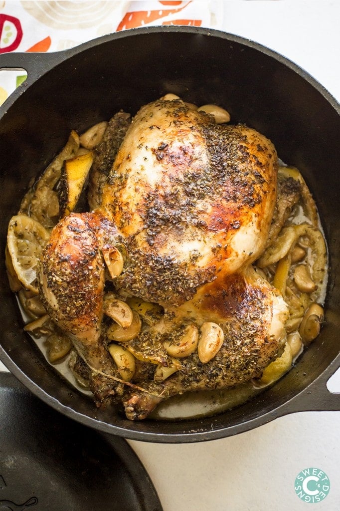 picture of lemon garlic whole roasted chicken in a dutch oven 