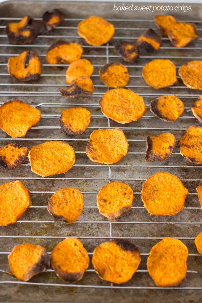 sweet potato sliced with salt on them on a wire tray