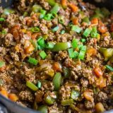 A Paleo taco skillet filled with meat and vegetables.
