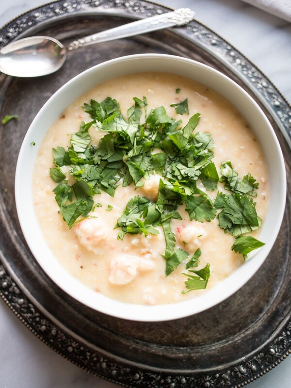 A bowl of langoustine soup with grits.