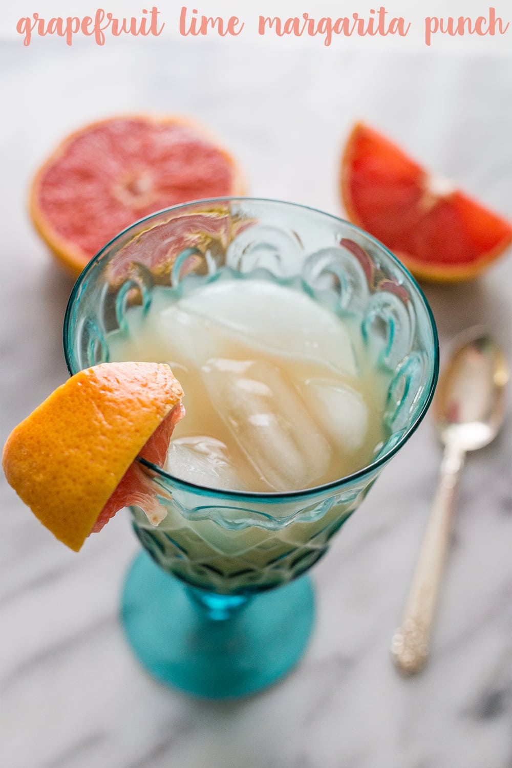 This grapefruit lime margarita punch is a delicious cocktail erfect for parties- mocktail recipe, too!