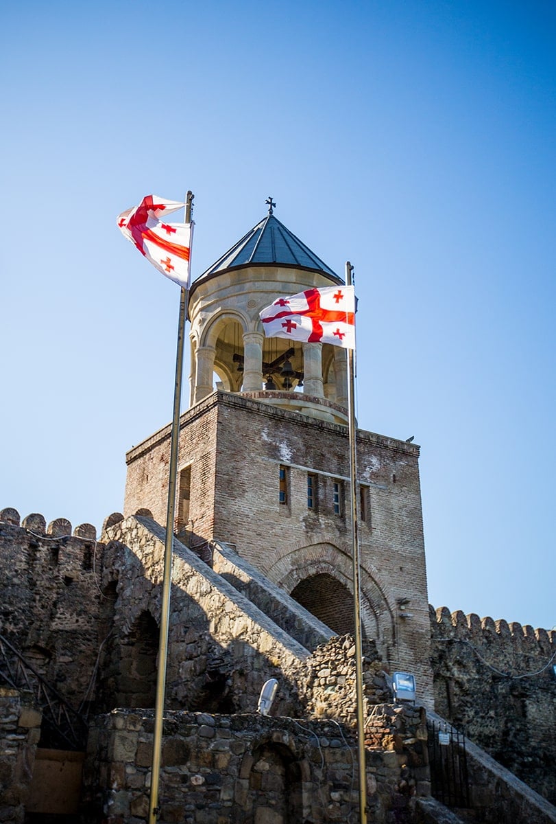 Georgian Flag flying outside cathedral, Mtskheta Georgia