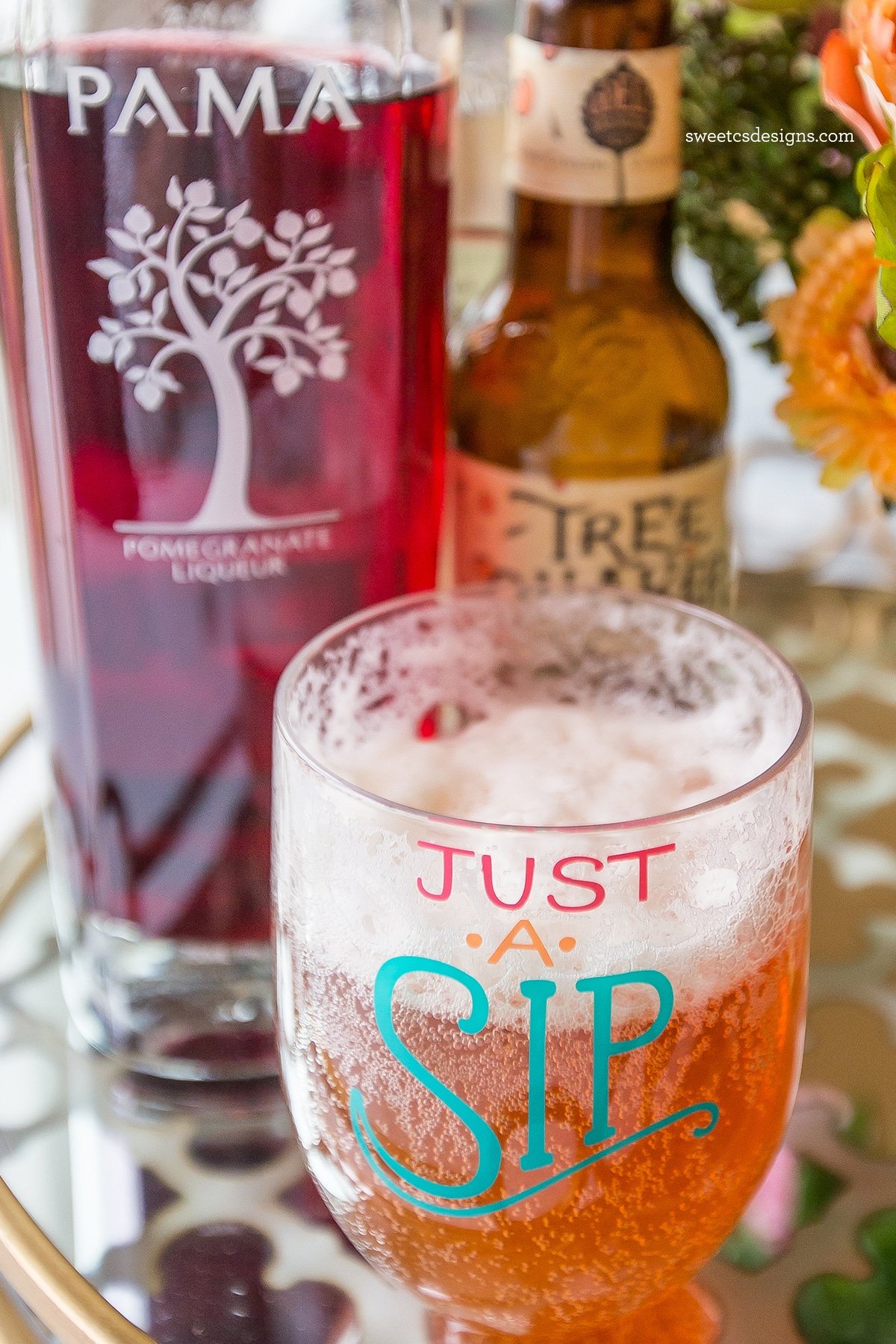 pomegranate liquor and ipa beer, mixed cocktail in a just a sip cup