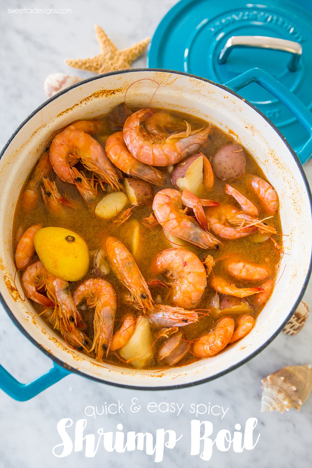 pot with potatoes, shrimp, and sauce in it