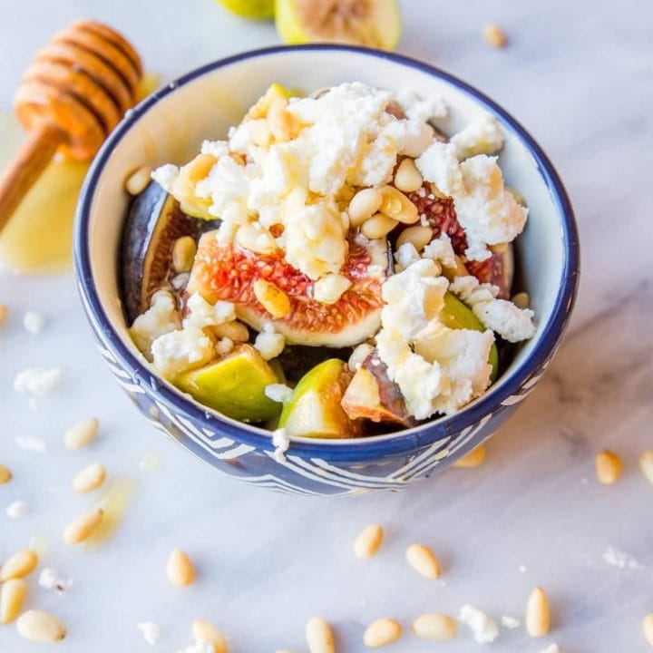 Fig and feta salad with honey and pine nuts.