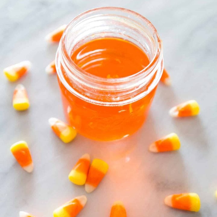 Candy corn jar infused with moonshine.
