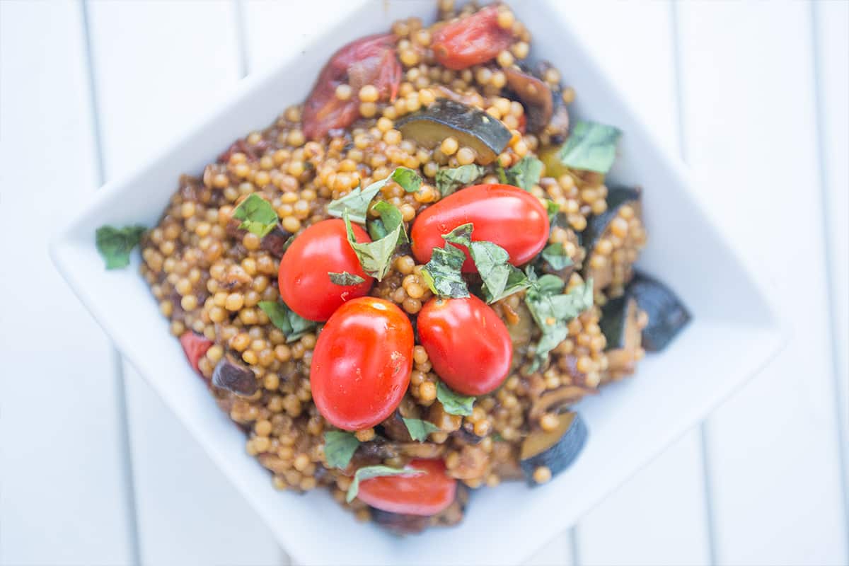 couscous with sauteed, onions, mushrooms, zucchini, tomatoes, and basil in it. 