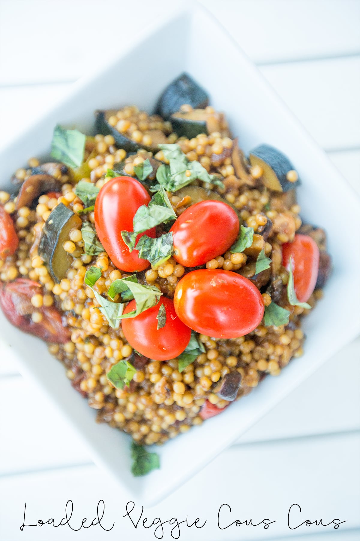 couscous with sauteed, onions, mushrooms, zucchini, tomatoes, and basil in it. 