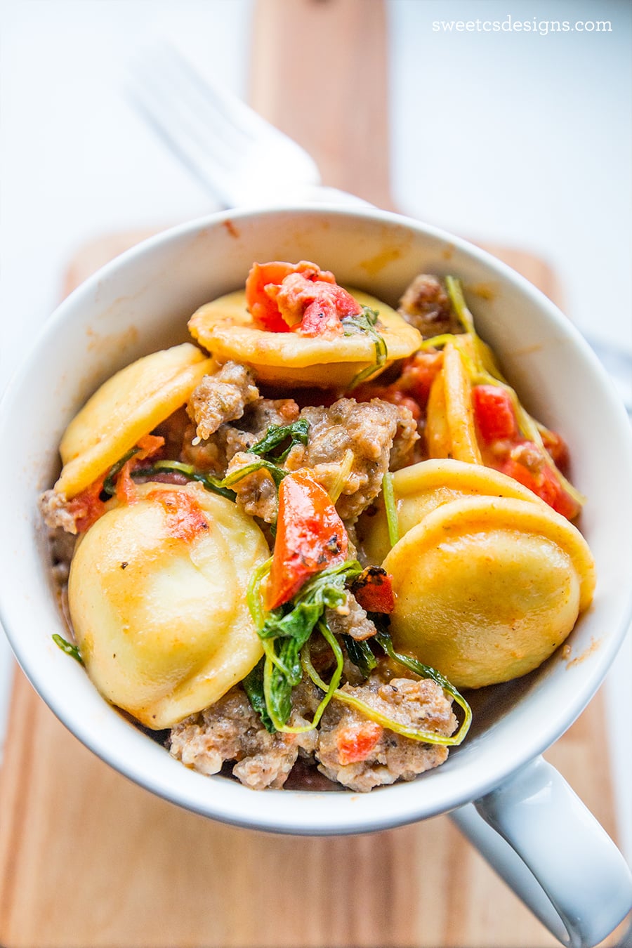 This ravioli and sausage skillet is so delicious- my family devours it!