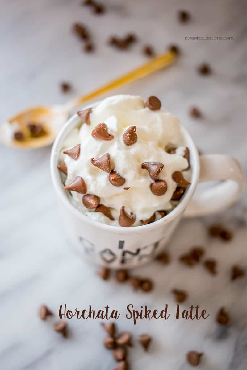 picture of I cant even mug with whipped cream and chocolate chips and a golden spoon from above. 