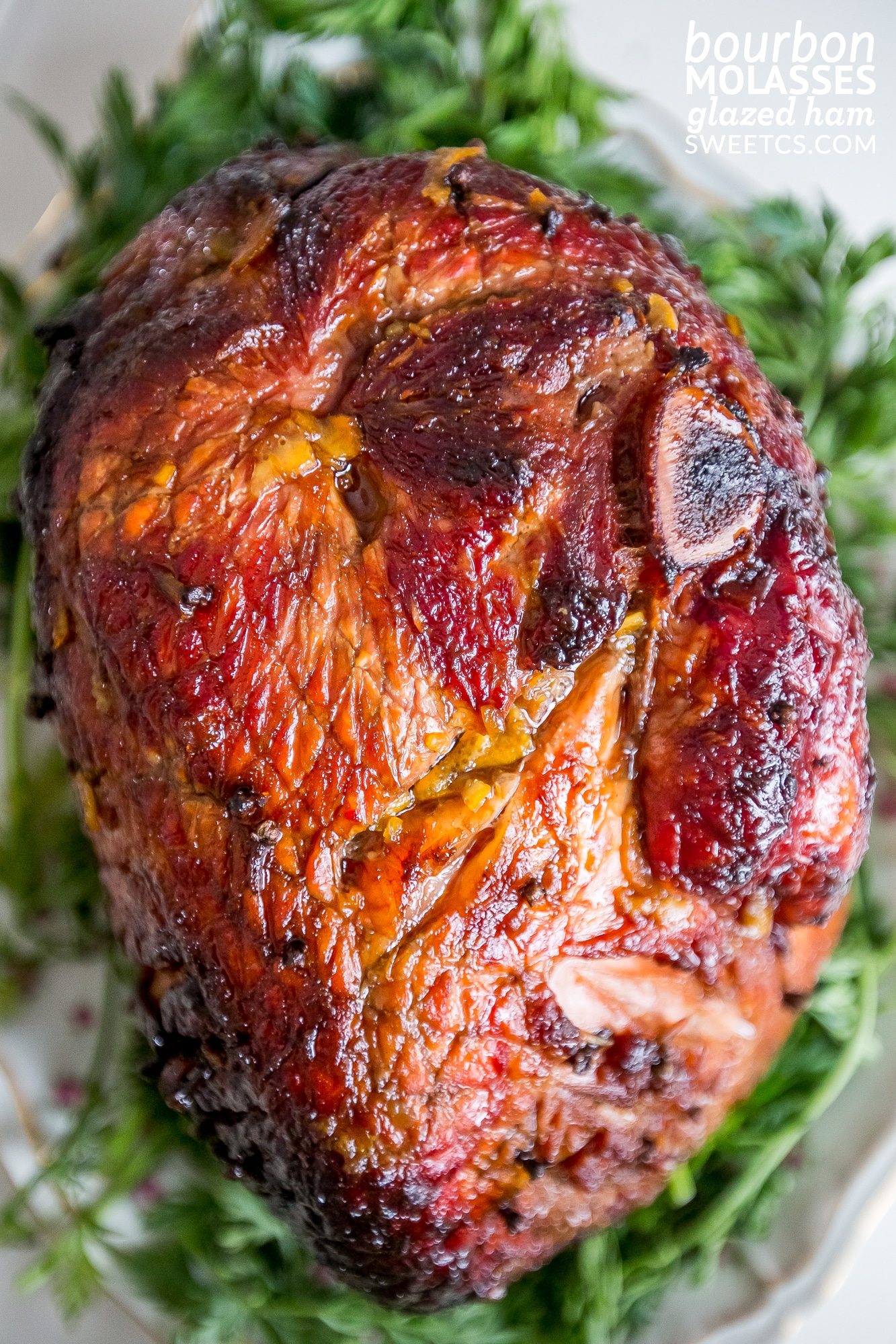 This is the best glazed ham recipe- made with bourbon and molasses with a unique twist!