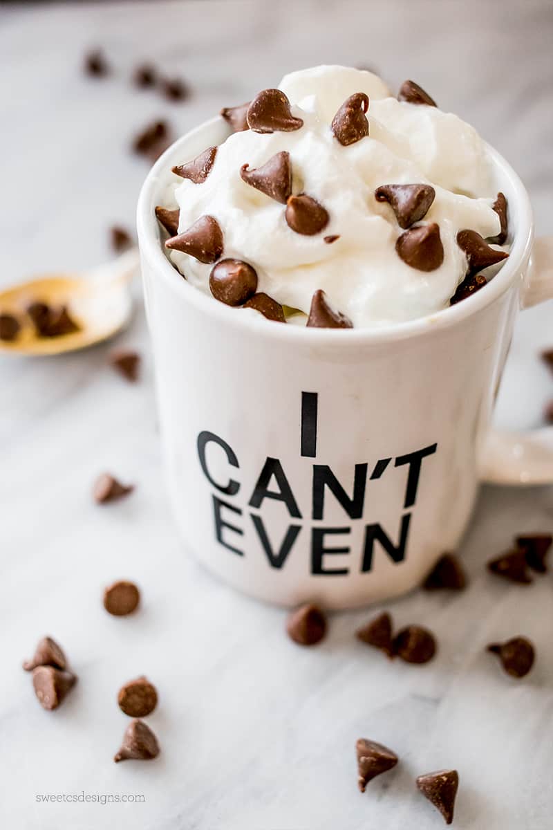 picture of I cant even mug with whipped cream and chocolate chips and a golden spoon.