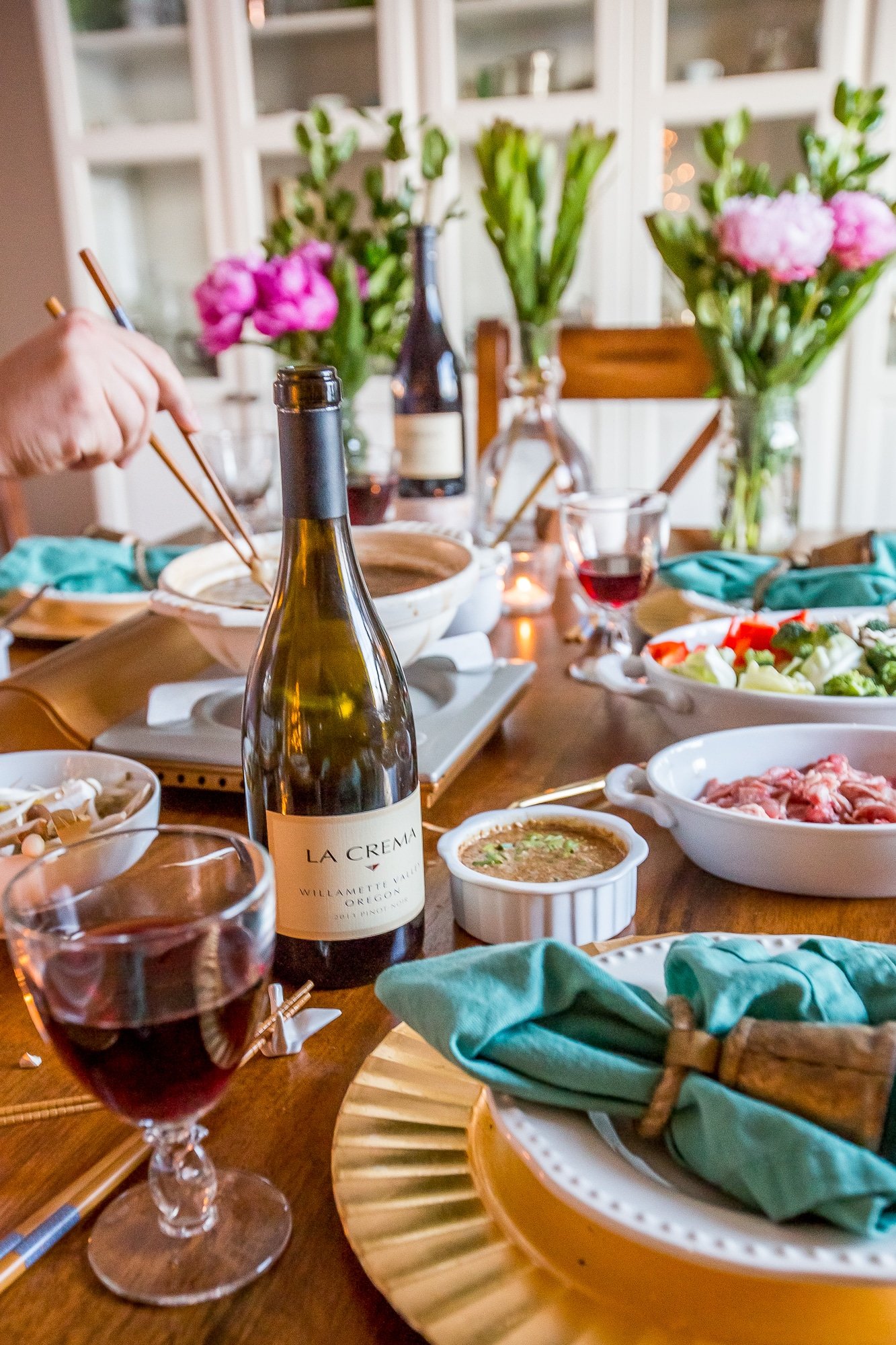 table set for nice dinner with sesame asian dipping sauce