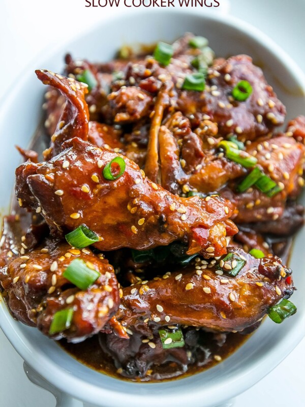 Sweet and sour honey soy chicken wings in a white bowl.