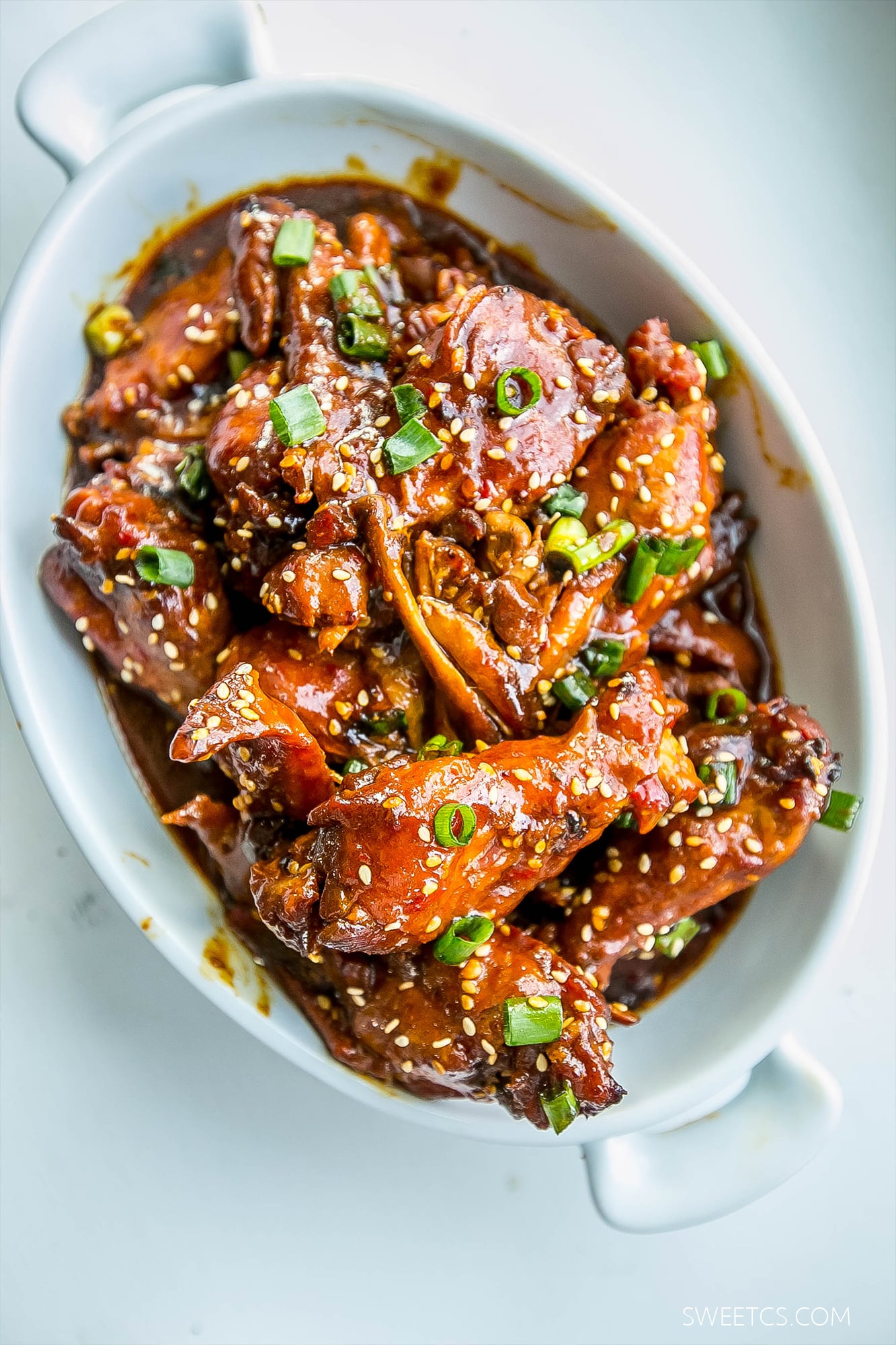 honey soy wings in a white casserole dish