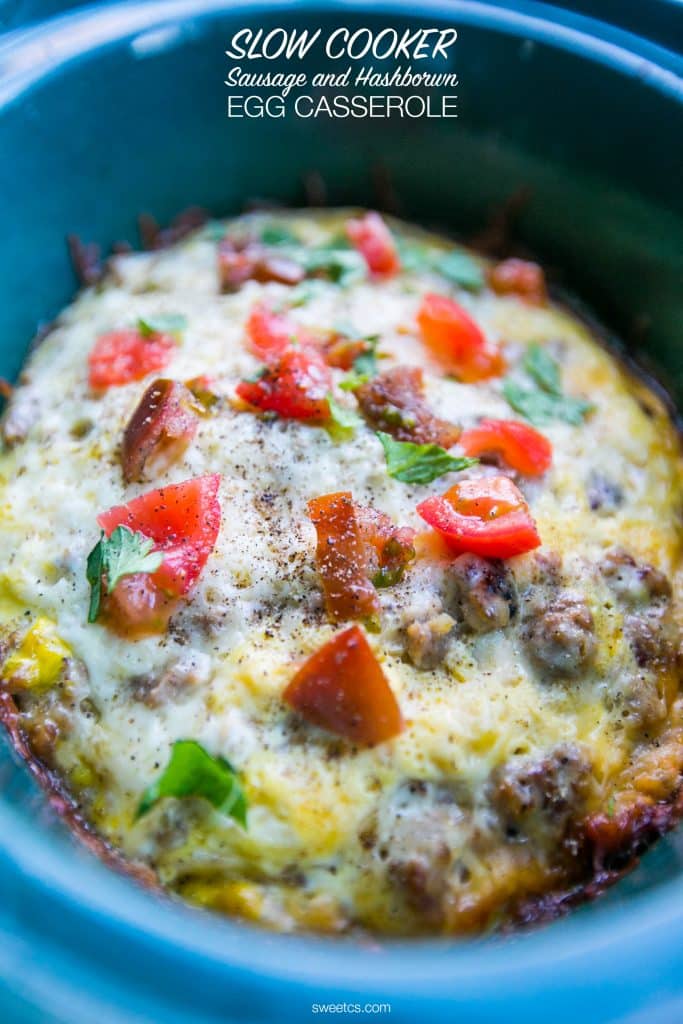 This slow cooker egg sausage and hashbrown casserole in a blue slow cooker.