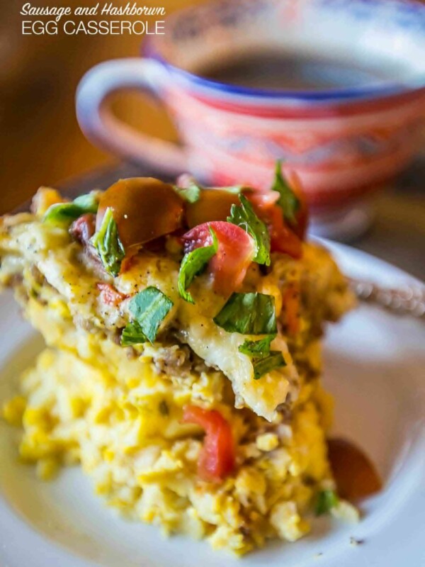 Slow cooker breakfast casserole served with coffee.