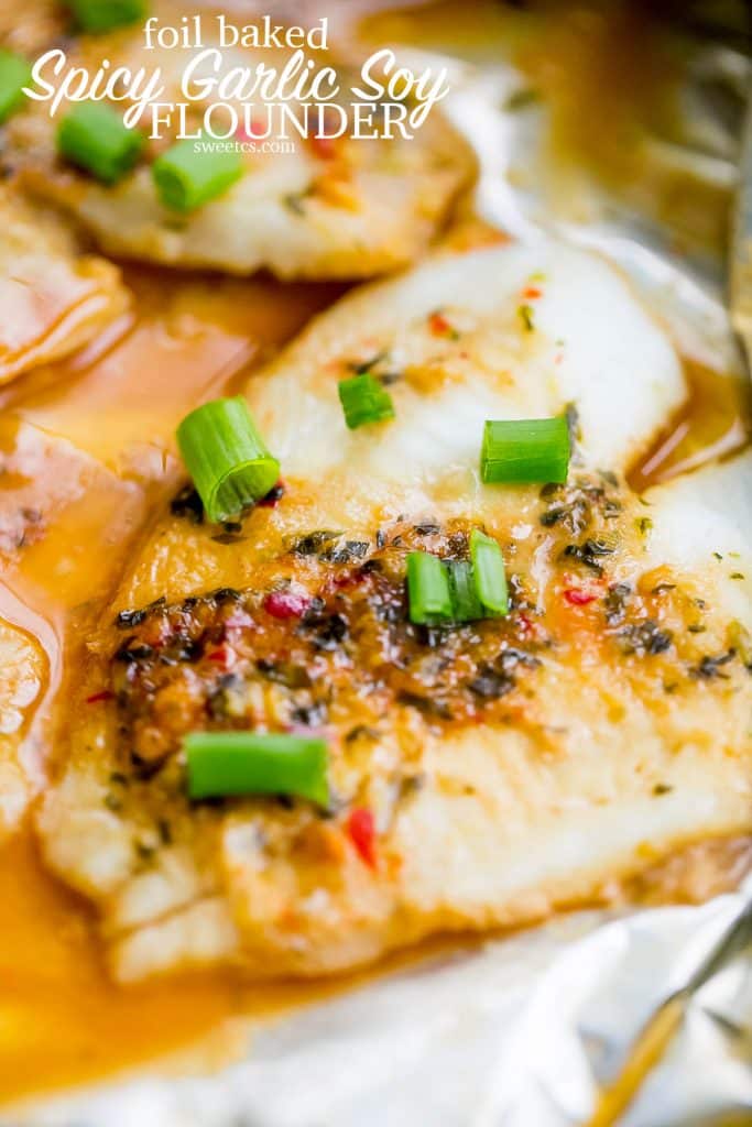 Foil pouch baked flounder with a garlic soy glaze - spicy, salty, and a little touch of tangy asian inspired flavors in a mess-free pouch!