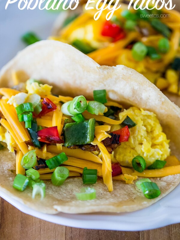 Poblano egg breakfast tacos on a white plate.