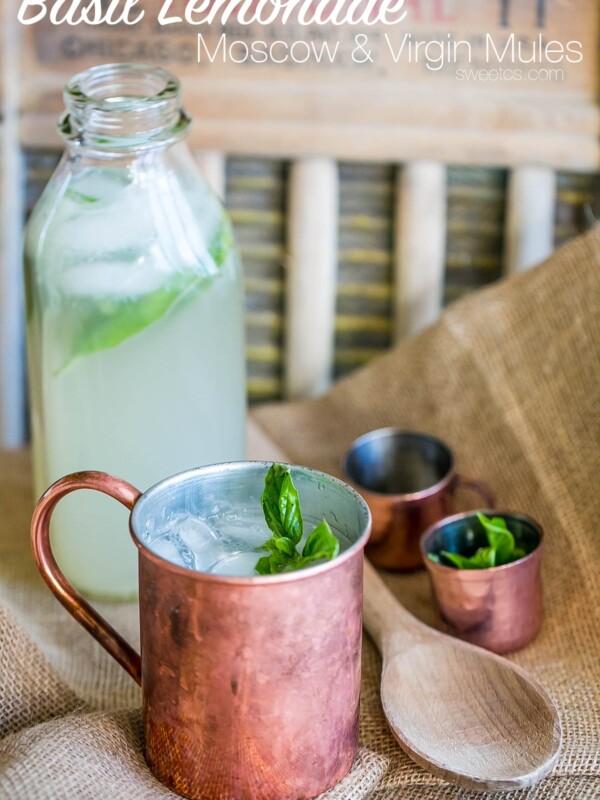 Basil lemonade served in a copper mug.