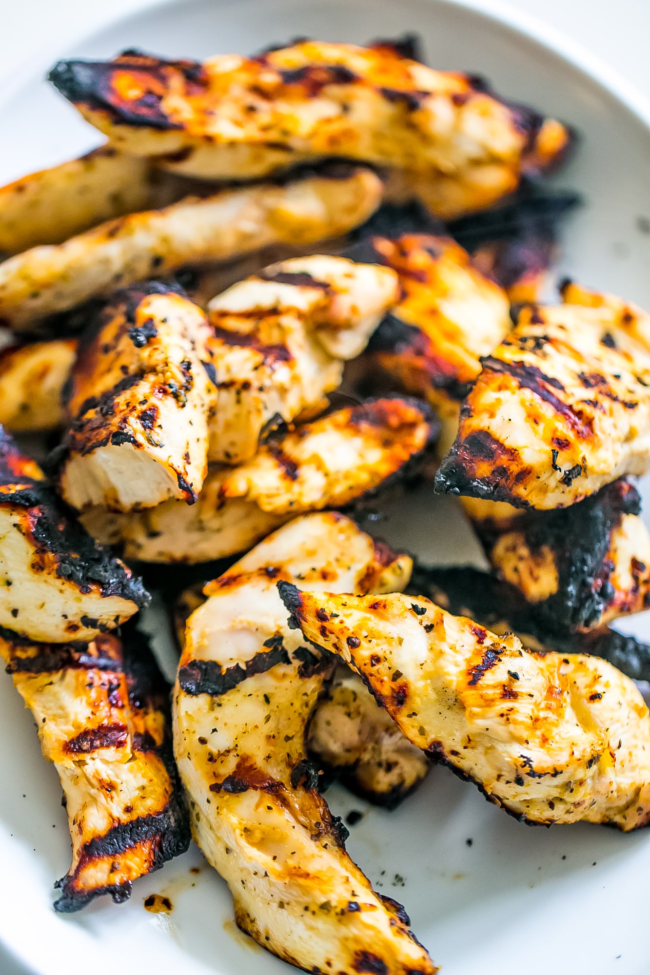 picture of grilled chicken strips up close.