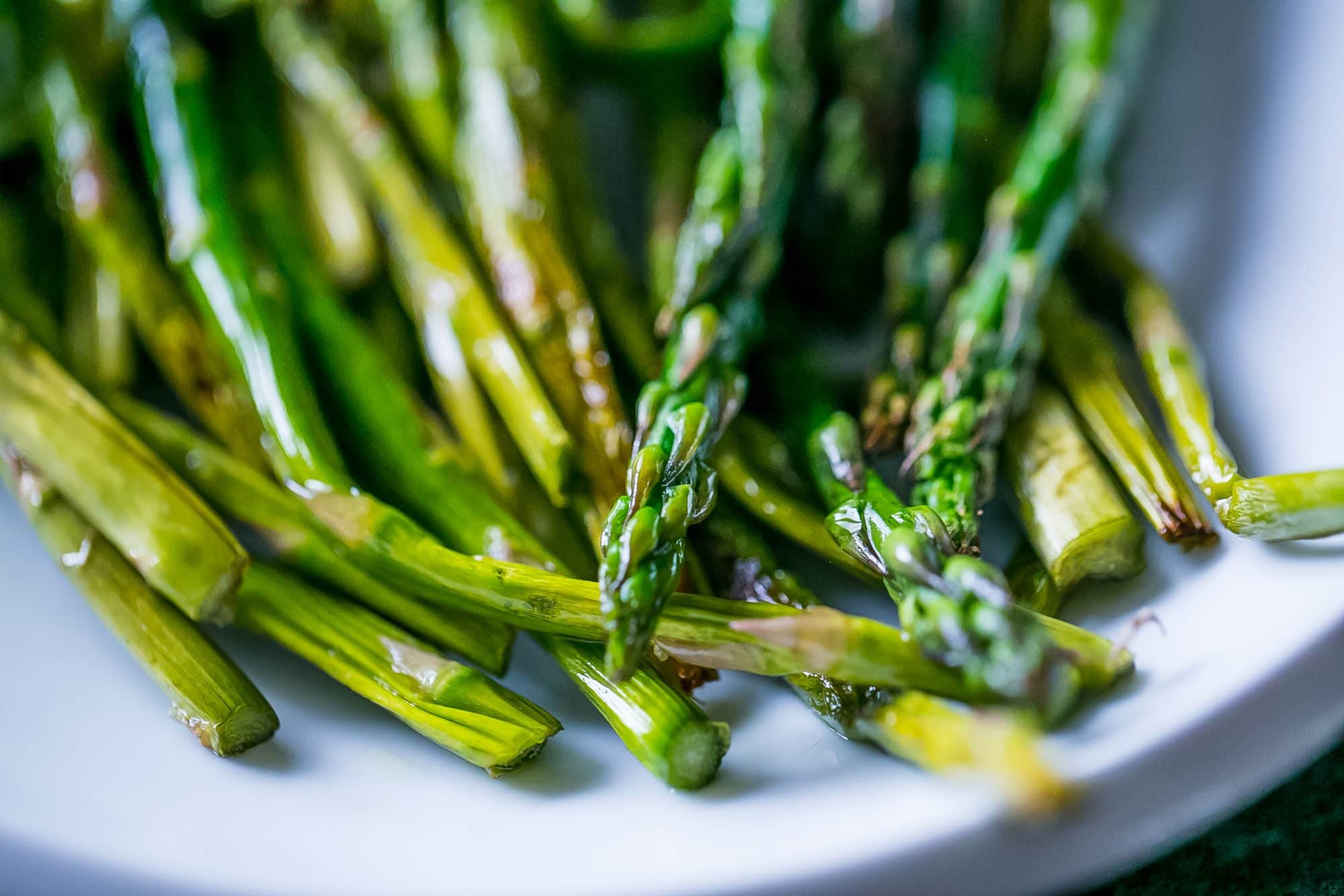 cooked asparagus in a pile