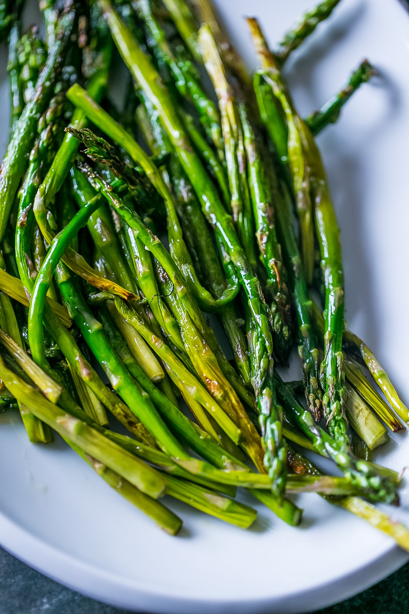 cooked asparagus in a pile