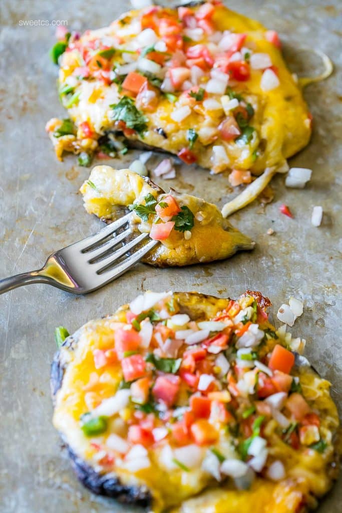 mushrooms caps with Pico and cheese on them