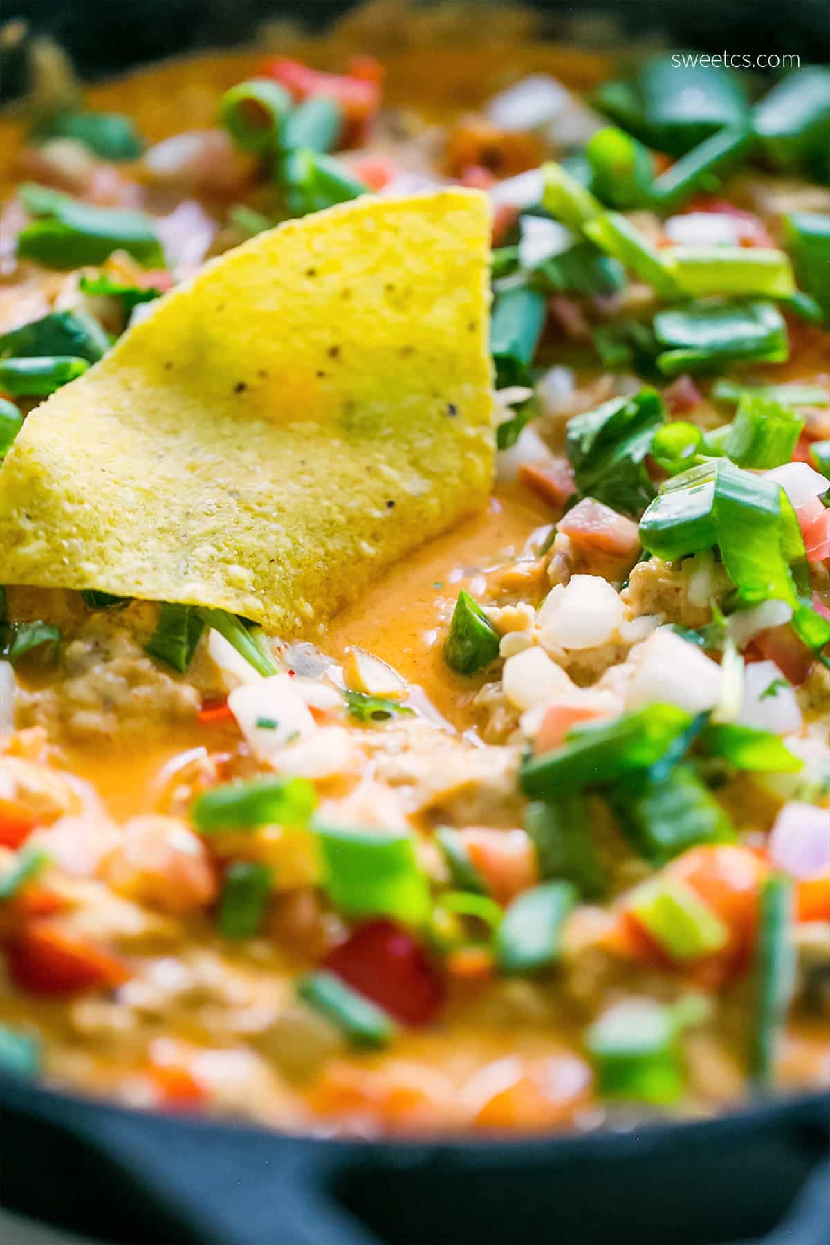 This dip is so delicious- full of cheesy chicken enchilada flavors!