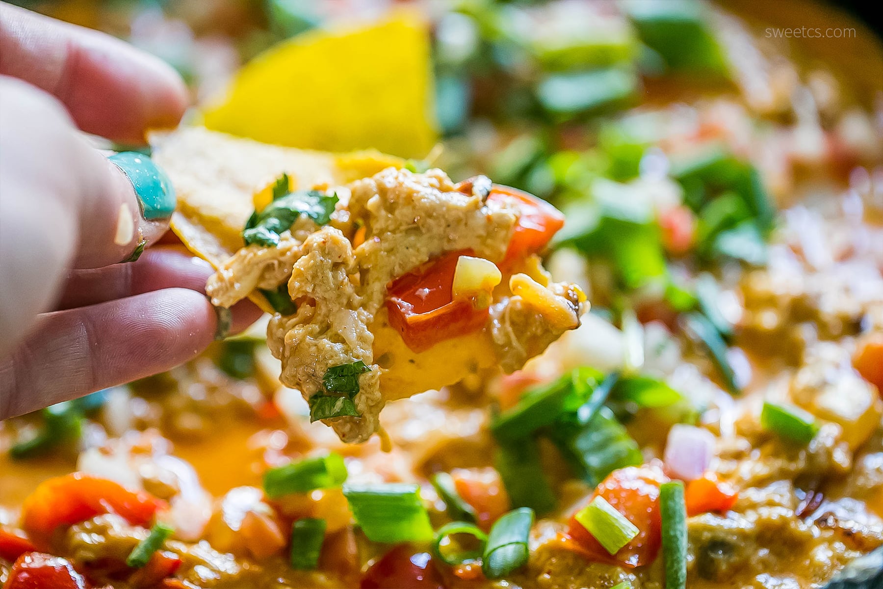 This dip is so delicious- tons of cheesy chicken enchilada flavor, and so easy!