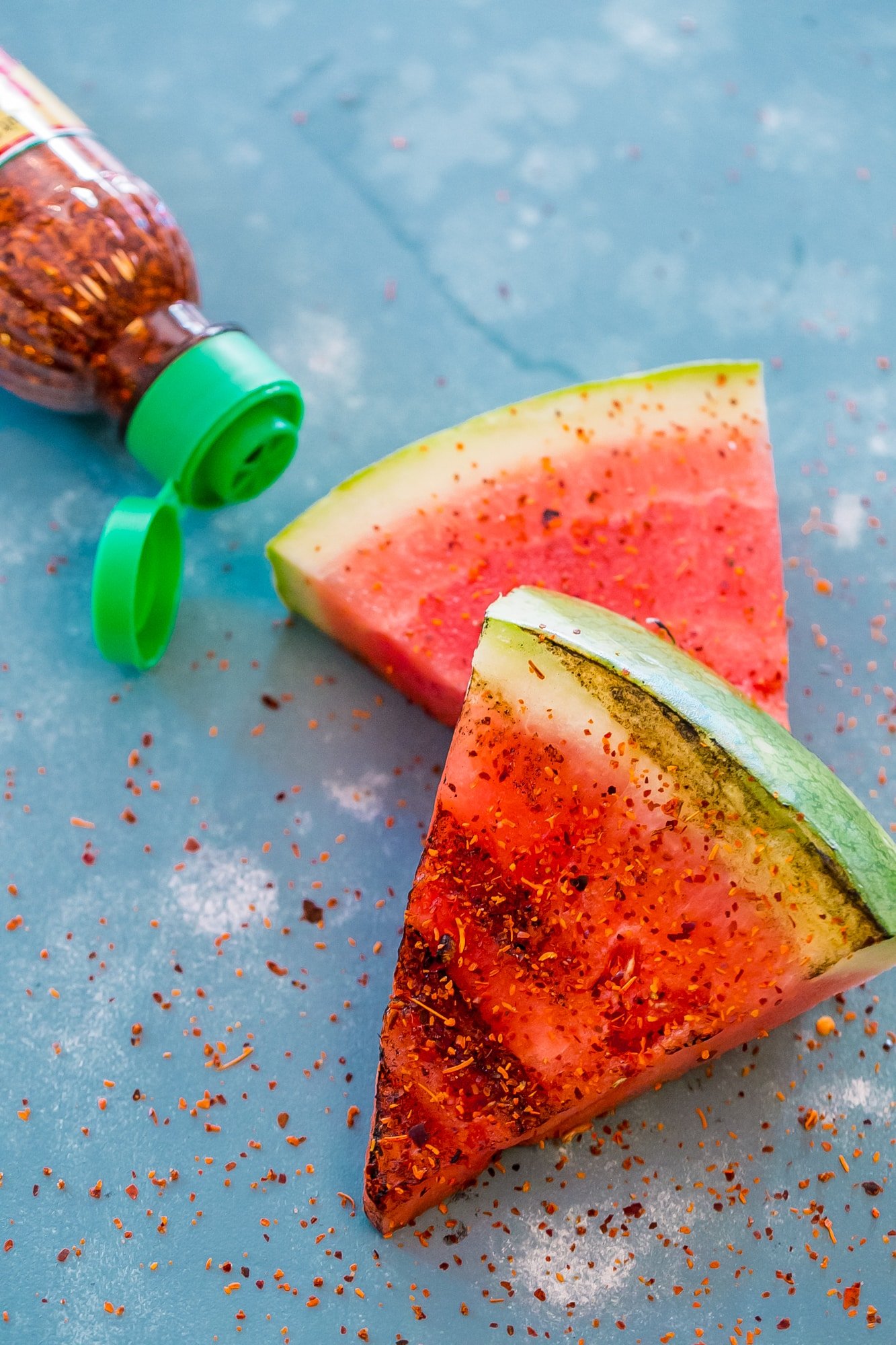 watermelon with grill marks and spices next to it