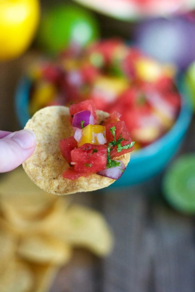 picture of watermelon salsa in a blue bowl on a chip