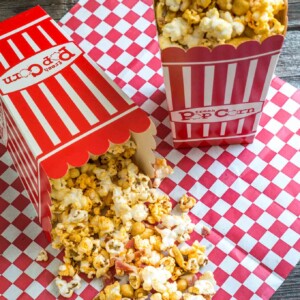 Honey nut popcorn with bacon is the perfect snack and would be amazing for a tailgate party. Make plenty because it's addicting | HostessAtHeart.com