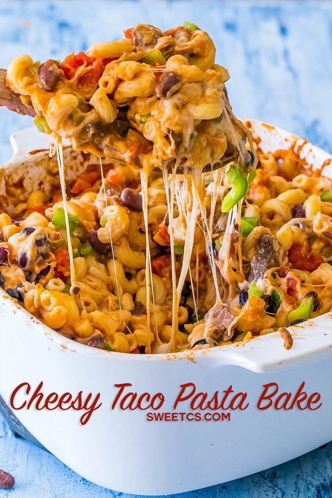 casserole dish with bell peppers, cheese, beans, diced tomatoes, pasta, and steak