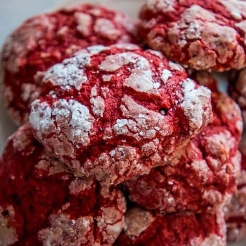 Red velvet cookies arranged on a white plate.