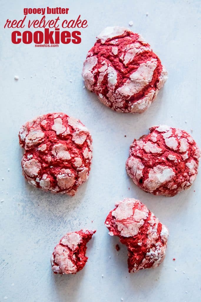 red velvet cake cookies set out with a bite out of one of them