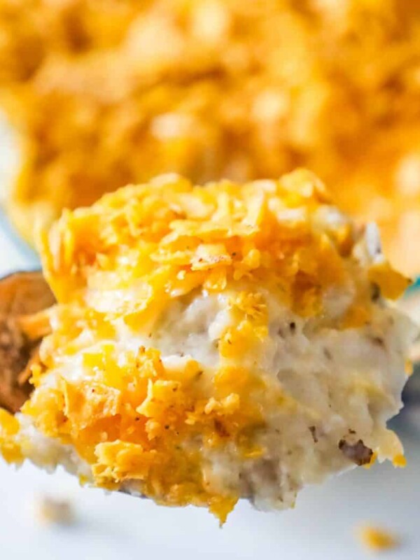 Cheesy Ranch Potato Casserole with a spoonful of mashed potatoes.