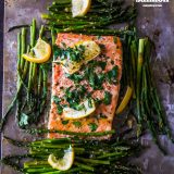 Easy lemon garlic salmon and asparagus recipe on a baking sheet.
