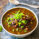 Spicy Mexican black bean soup in a bowl.